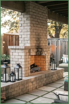 Outdoor patio with a brick fireplace, surrounded by lanterns and seating. Outdoor Wall Fireplace, Cinder Block Outdoor Fireplace, Outdoor Chimney Fireplace, Build An Outdoor Fireplace, Kitchen Flooring Trends, Porch Renovation, Outdoor Fireplace Ideas, Kitchen Tile Inspiration, Rustic Industrial Kitchen