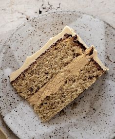 a piece of cake sitting on top of a white plate