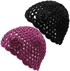 two crocheted beanies are shown side by side on a white background, one is black and the other is purple