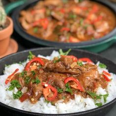 two plates of food with rice and meat on them