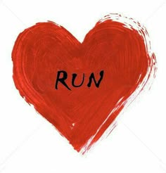 a red heart with the word run written on it's side in black ink