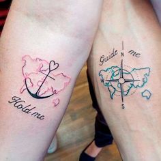 two people with matching tattoos on their arms, one has a compass and the other has a heart