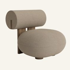 an upholstered chair with a wooden armrest and foot rest in beige fabric