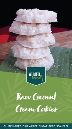 a stack of raw coconut cream cookies on top of a leafy green plate with the title