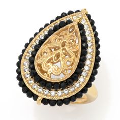 Make a beautiful statement on your finger with this Gaetano filigree ring. Crafted in 18K yellow gold plated sterling silver, it features an ornate filigree design at the center. Surrounding the cutout design are halos of black onyx gemstones, simulated diamonds and more black onyx. You'll love the complementary colors and dazzling sparkle. Intricate beading, a polished finish and a smooth thin band complete the captivating design. It will elevate any look, whether you're going casual or dressin Intricate Beading, Mens Gold Jewelry, Cutout Design, Italian Jewelry, Filigree Design, Filigree Ring, White Mark, Pendant Rings, Size 10 Rings