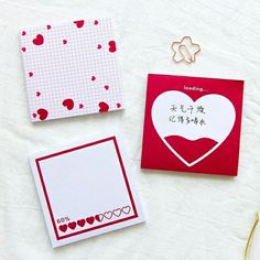 three different types of greeting cards on top of a white table with scissors and other items