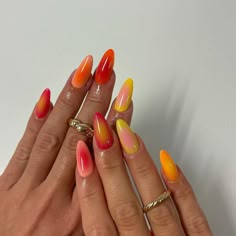 These nails feature a vibrant gradient design with shades of pink, orange, and yellow, reminiscent of a summer sunset.  🌸Click on the image to shop our trending Korean Gel Polish this season.  🌸Credit: nails_by_arlene on Instagram 🌸Summer nails, simple summer nails, sunset nails, gradient nails, ombre nails, bright nail colors, summer manicure, pink nails, orange nails, yellow nails, gel polish nails, Korean nail trends, summer nail art, vibrant nails, trendy nails, hot weather nails, beach nails, tropical nails, colorful nails, summer vibes, nail inspiration. Cute Colorful Nails For Summer, Orange Nail Colors Summer, Nails Design Bright Colors, Simple Nails Almond Summer, Bright Color Manicure, Summer Cool Nails, Hot Colors Nails, Nail Inspiration Color, Cool Nail Inspo Summer