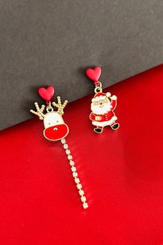 Santa and Reindeer Dangling Enamel Christmas earrings , Christmas Dangle Earrings,Xmas Gift for her,Accessories for Xmas Parties **Joyful Elegance: Santa & Reindeer Festive Earrings    Celebrate the holiday season in style with our **Santa Claus and Reindeer Dangling Earrings These adorable earrings feature the classic duo of Santa 🎅 and his reindeer 🦌, bringing festive charm to your look with every swing.   Perfectly crafted for the holiday season, the lightweight design ensures all-day comfort while the whimsical details add a touch of magic ✨. Whether you're dressing up for a Christmas dinner 🎄🍽️, a cheerful gathering with friends 🎉, or simply spreading holiday joy, these earrings are the ultimate festive accessory!   Pair them with your favorite cozy sweaters 🧣 or sparkling party Santa Claus And Reindeer, Xmas Gifts For Her, Santa And His Reindeer, Gathering With Friends, Chic Holiday, Santa Reindeer, Earrings Christmas, Santa And Reindeer, Christmas Earrings