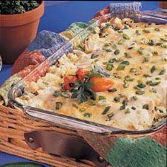 a casserole dish with vegetables and cheese