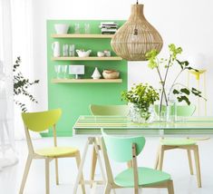 two pictures of different colored chairs and tables in a room with open shelves on the wall