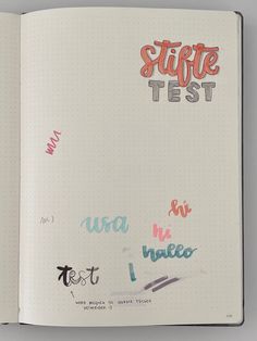 an open notebook with writing on it and the words state test written in different languages