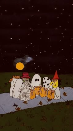 three ghost sitting on the ground in front of a full moon and some pumpkins