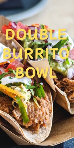 two burritos sitting on top of each other with toppings and the words double burrito bowl