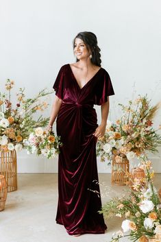 Our graceful Gwen dress is an excellent modest look as it offers more coverage with its wide V-neckline and angel sleeves! This velvet dress comes with built-in bra cups and a front twist detail that adds sophistication to a timeless silhouette. Velvet Bridesmaid Dresses, Burgundy Bridesmaid, Burgundy Bridesmaid Dresses, Groom Dress, Gorgeous Gowns, Wedding Bridesmaid Dresses, Mother Of The Bride Dresses, Velvet Dress, Guest Dresses