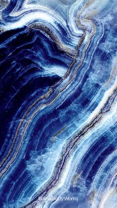 blue and white marble textured with metallic foil on the bottom, as seen from above