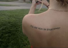 the back of a woman's neck with an inscription on it that reads, i'll'll see you in every sunset