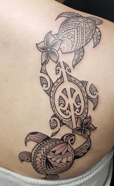 a woman with a tattoo on her stomach has a clock and fish in the background