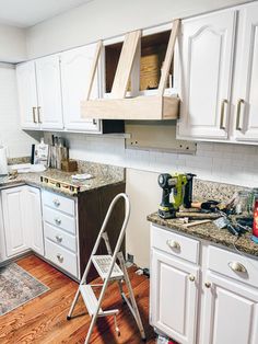 the kitchen is clean and ready to be used as a work space for the new owner