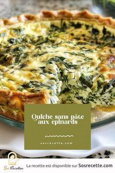 a quiche with spinach and cheese in a glass pie dish on a table