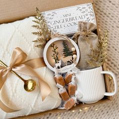 a gift box with coffee, cookies and other items in it for someone's special occasion