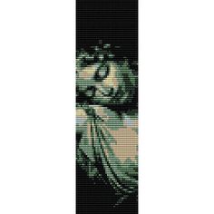 a cross stitch pattern of a woman with her eyes closed