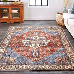 A dazzling display of the most intricately crafted floor coverings from all over the world, this Percy Blue and Rust area rug boasts the breathtaking appearance of antique authenticity. Silken shades of tradition in indigo, rust, cream, and black mingle with the more brilliant and bold magenta, gold, and aqua to create a rug that appears to be procured from an exotic bazaar. An opulent aesthetic with superior styling, this Percy area rug is the answer to today's need for affordable luxury in the home! 2' x 3' Machine washable for easy care Luxuriously vibrant colors Fade resistant polyester fabric Blue Orange Rug, Opulent Aesthetic, Natural Cabinets, Wall Mount Tv Stand, Rug Backing, Rust Area Rug, Marble End Tables, White Fireplace, Washable Area Rug