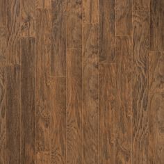 an image of wood flooring with dark brown tones