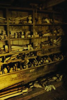 an old wooden cabinet filled with lots of tools