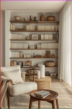 a living room filled with furniture and bookshelves next to a wall full of shelves