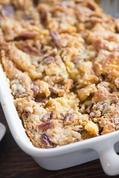 a casserole dish filled with baked goods on a table