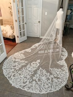 a bridal veil is laying on the floor