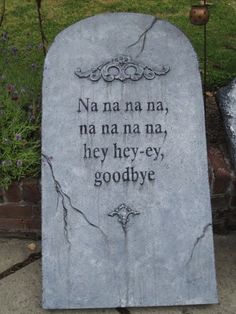 a grave with a poem written on it