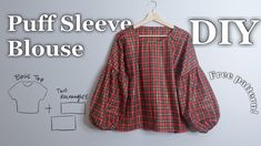 a red and black plaid shirt hanging on a wall with the words puff sleeve blouse