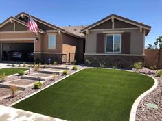 a house with grass in the front yard