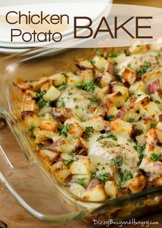 a casserole dish with chicken, potatoes and parsley in it on a wooden table