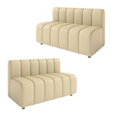 two white couches sitting next to each other