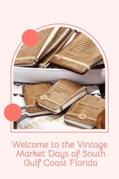 a bunch of books sitting on top of a table next to an open book with the words welcome to the vintage market days of south gulf coast florida