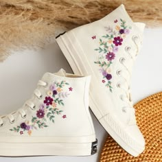 ''Custom Embroidered Wedding Converse, Purple Flowers Embroidered Sneakers Custom, Bridal Flowers Embroidered Shoes Custom, Personalized Gifts for Her, Wedding Gifts'' 🍀 Price includes Converse Shoes and Floral Embroidery Designs as shown 🍀 🍀 Shoe Type: Converse 1970s 🍀 Shoe color: 2. Invory_1970s 1. DETAILS 🍀 You can send me your Converse, Vans, canvas shoes or I can buy them for you. Custom-ordered embroidered Vans and Converse shoes, please wait another 2-4 days. Each pair is hand embroidered to order, please make sure you put in the correct shoe size before you check out. The embroidery is meticulous and does not fade. 🍀 You will receive Vans and Converse shoes with floral embroidery designs as above. 2. PERSONAL EXPRESSION 🍀 Create your unique vibe by your own design of embroid Boty Converse, Converse Embroidery, Cute Converse Shoes, Sneakers Purple, Embroidered Converse, Cute Converse, Wedding Converse, Wedding Sneakers, Pretty Shoes Sneakers