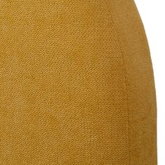 a close up view of the back of a yellow sweater