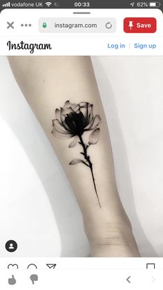 a black and white photo of a flower on the left arm, with an instagram logo above it