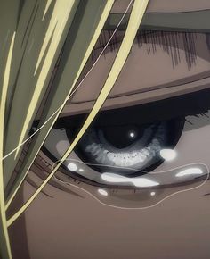 an anime character's eye with long blonde hair and eyeshade, looking into the distance