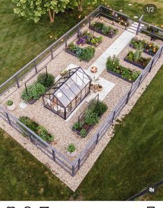 an aerial view of a small garden with lots of plants