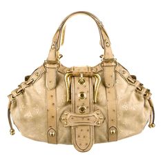 A stunning beige & gold suede and ostrich skin bag by Louis Vuitton Designed by Marc Jacobs This bag was produced in a very limited edition and made to order Finest suede leather imprinted with the famous LV monogram logo Golden hardware Ostrich skin trimming Lined with champagne-colored satin fabric Made in France Retailed for circa 8995$ plus taxes Please refer to the AD and editorial pictures for size / season reference only. The bag on sale is the same model however in the beige color. See a Men With Bags Fashion, Gold Monogram Canvas Shoulder Bag With Double Handle, Gold Monogram Canvas Satchel Shoulder Bag, Gold Monogram Canvas Bag With Gold-tone Hardware, Gold Monogram Canvas Shoulder Bag With Handles, Gold Tote Bag With Palladium Hardware, Luxury Gold Bag With Palladium Hardware, Luxury Gold Satchel With Handle Drop, Gold Satchel With Textured Leather And Double Handle