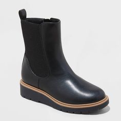 These Laurel Chelsea Boots from art class™ are perfect for your kid's school and fall adventures. The faux-leather boots have a solid-color upper with a round closed and medium width. Set on a 1.25-inch wedge heel, these Chelsea boots are designed with a distinct elastic panel on a side, along with a back pull tab and a side zipper for secure, snug wear. art class™: One-of-a-kind looks for the one and only you. Casual School Boots For Fall, Fall High-top Boots For School, School Boots For Fall With Round Toe, High-top Chelsea Boots With Lug Sole For Winter, Black Chelsea Boots With Zipper And Round Toe, Winter Black Mid-calf Boots With Lug Sole, Fall Adventures, Chelsea Ankle Boots With Lug Sole, Medium Width, Black Chelsea Boots With Reinforced Heel, Medium Width