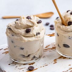 two glasses filled with ice cream and chocolate chips