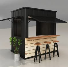 an outdoor bar with stools next to it and a potted plant in the corner