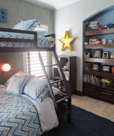 a child's bedroom with bunk beds and bookshelves