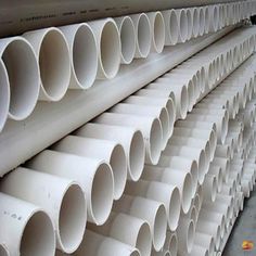 several white pipes stacked on top of each other