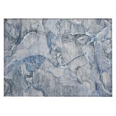 an area rug with blue and white marble pattern on it's edges, in front of a white background