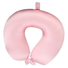 a pink neck pillow with a bow on it